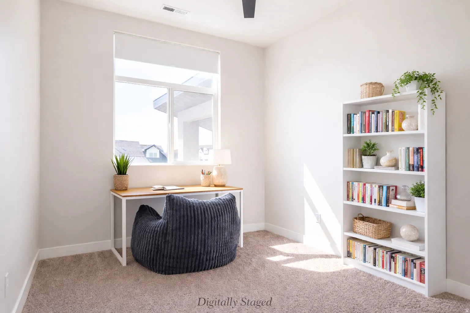 Office featuring light carpet and a desk