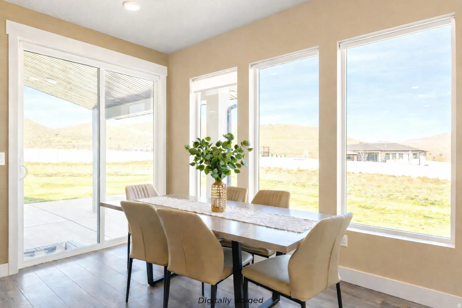 Dining room featuring a mountain view and wood finished floors