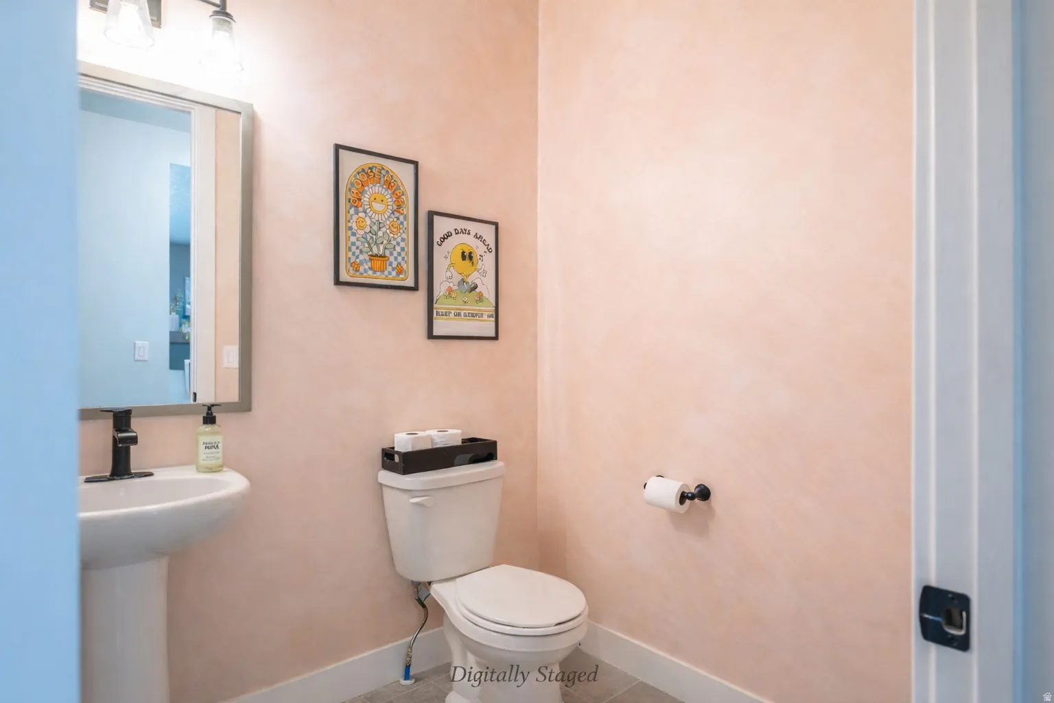 Bathroom with toilet and tile patterned floors