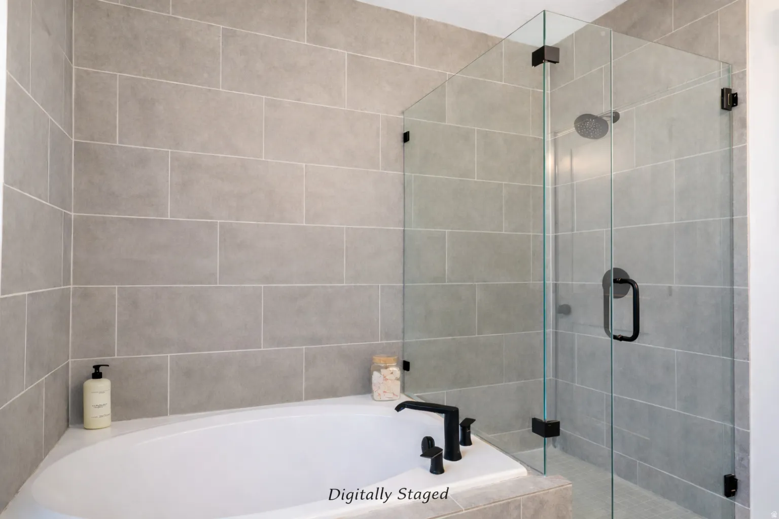 Bathroom featuring a stall shower and a garden tub