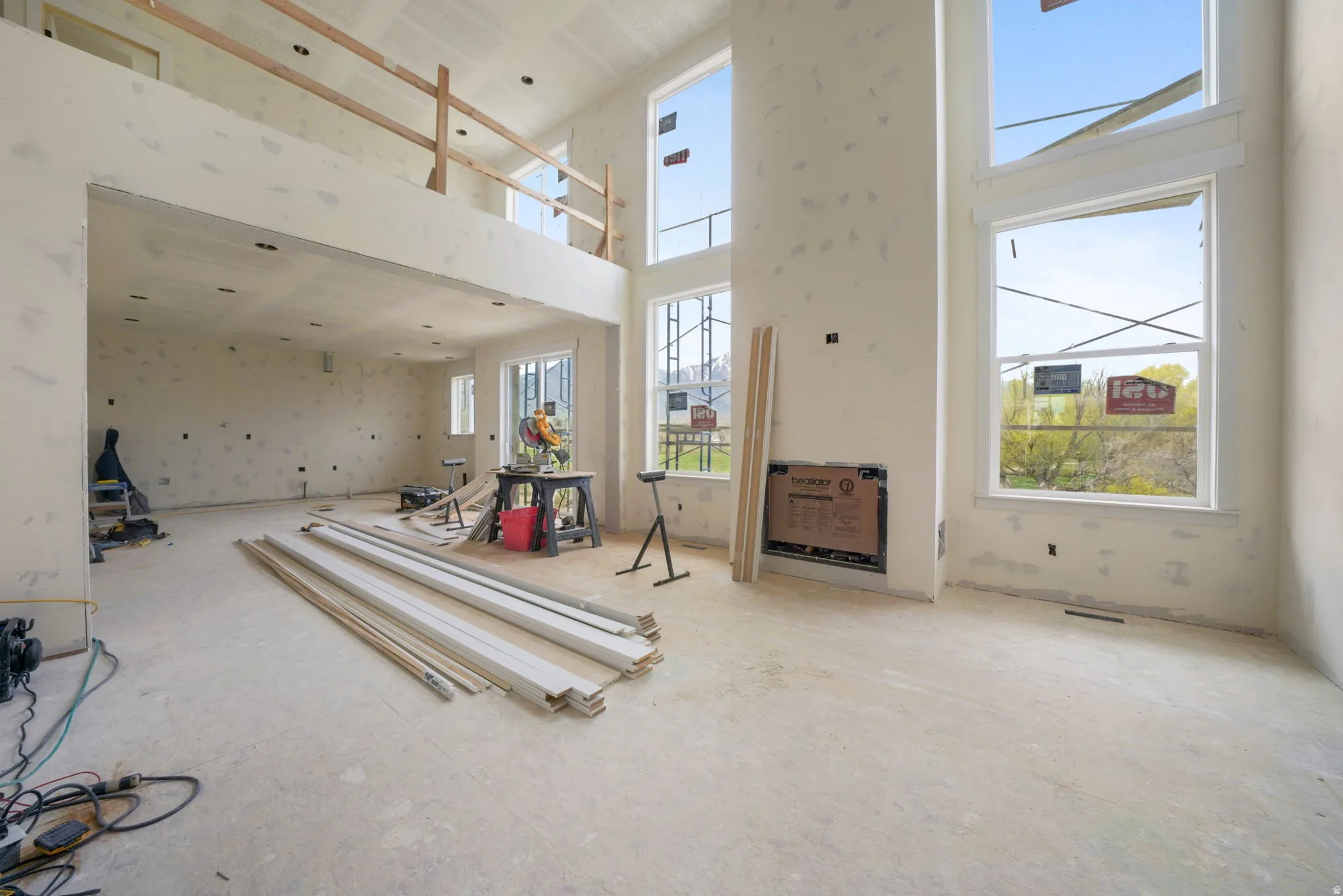 Miscellaneous room featuring a high ceiling