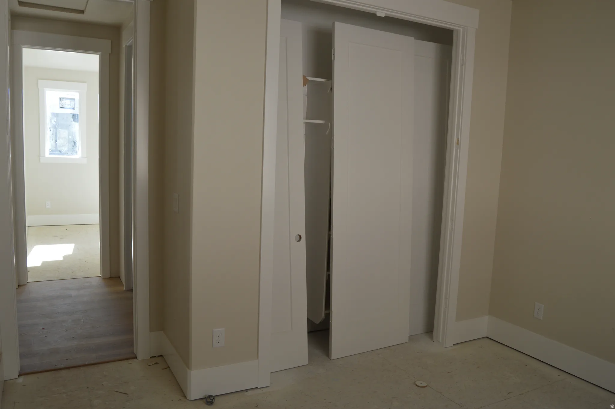 Unfurnished bedroom with baseboards and a closet