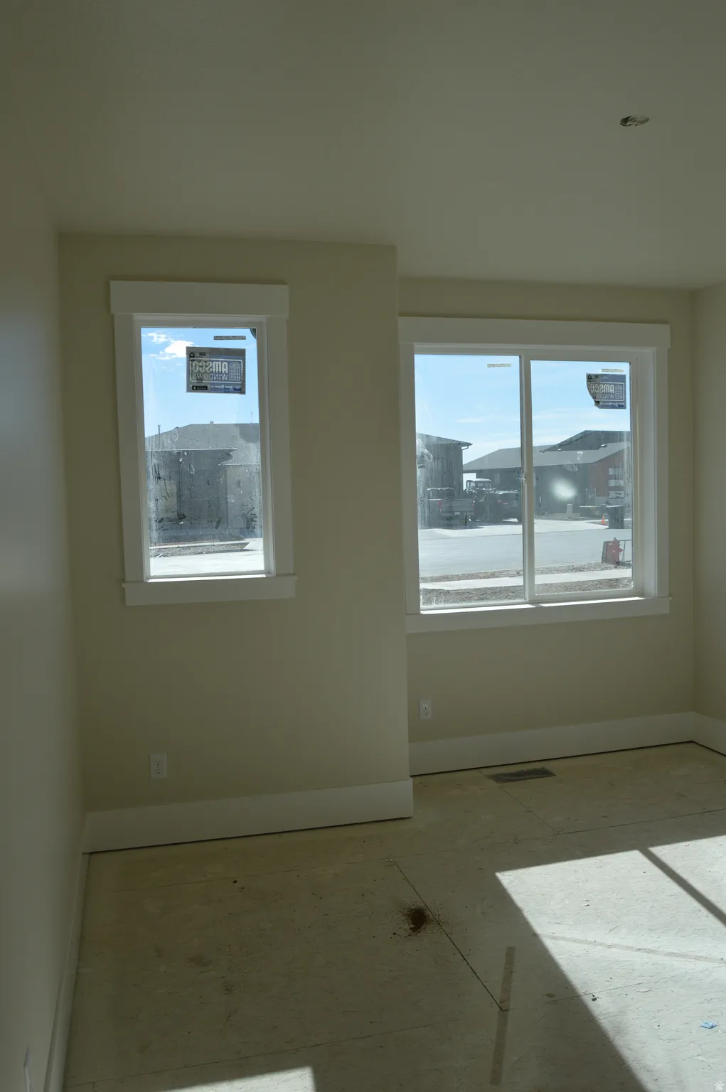 Unfurnished room featuring baseboards