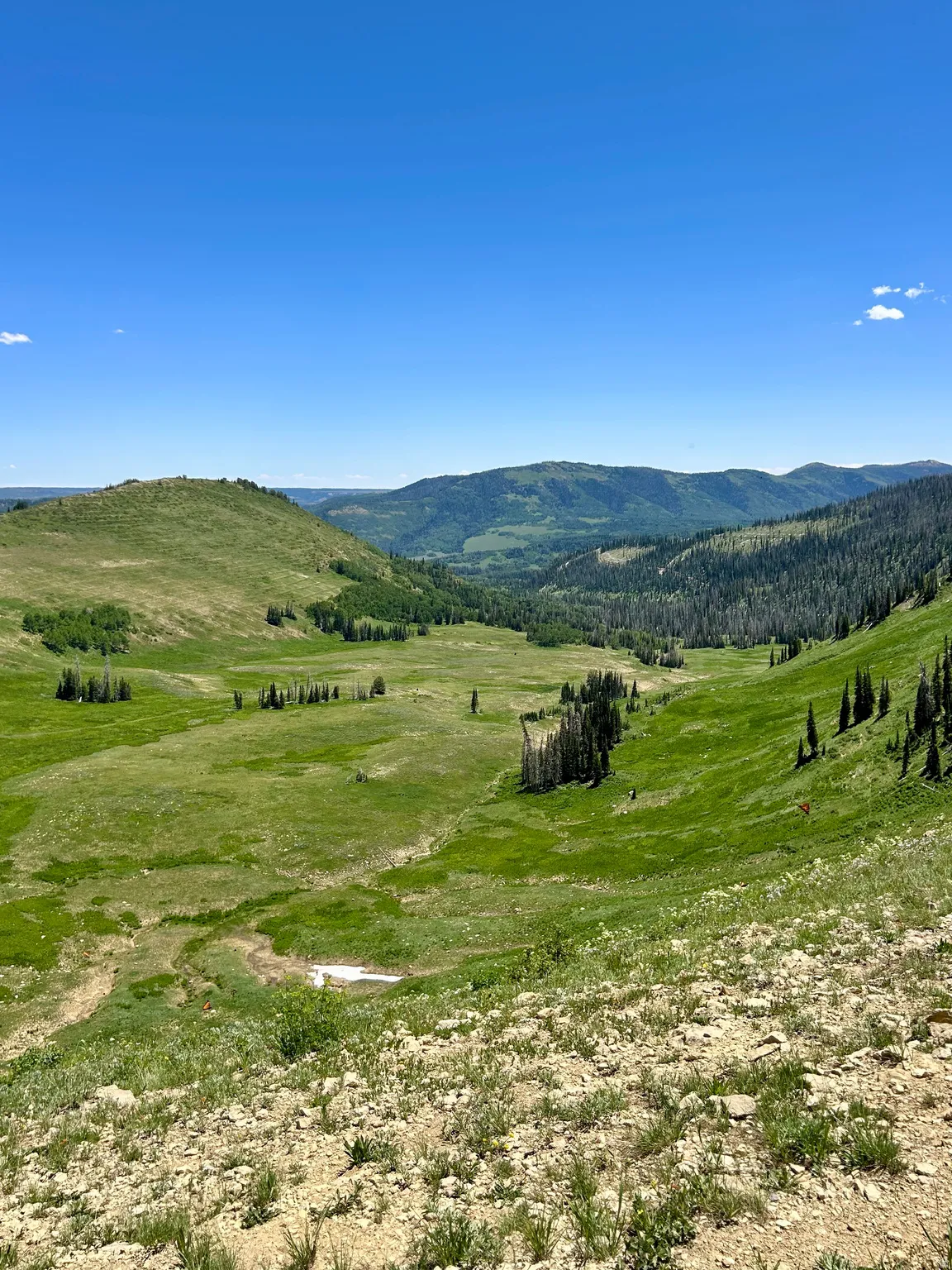 View of mountain backdrop featuring rural landscape
