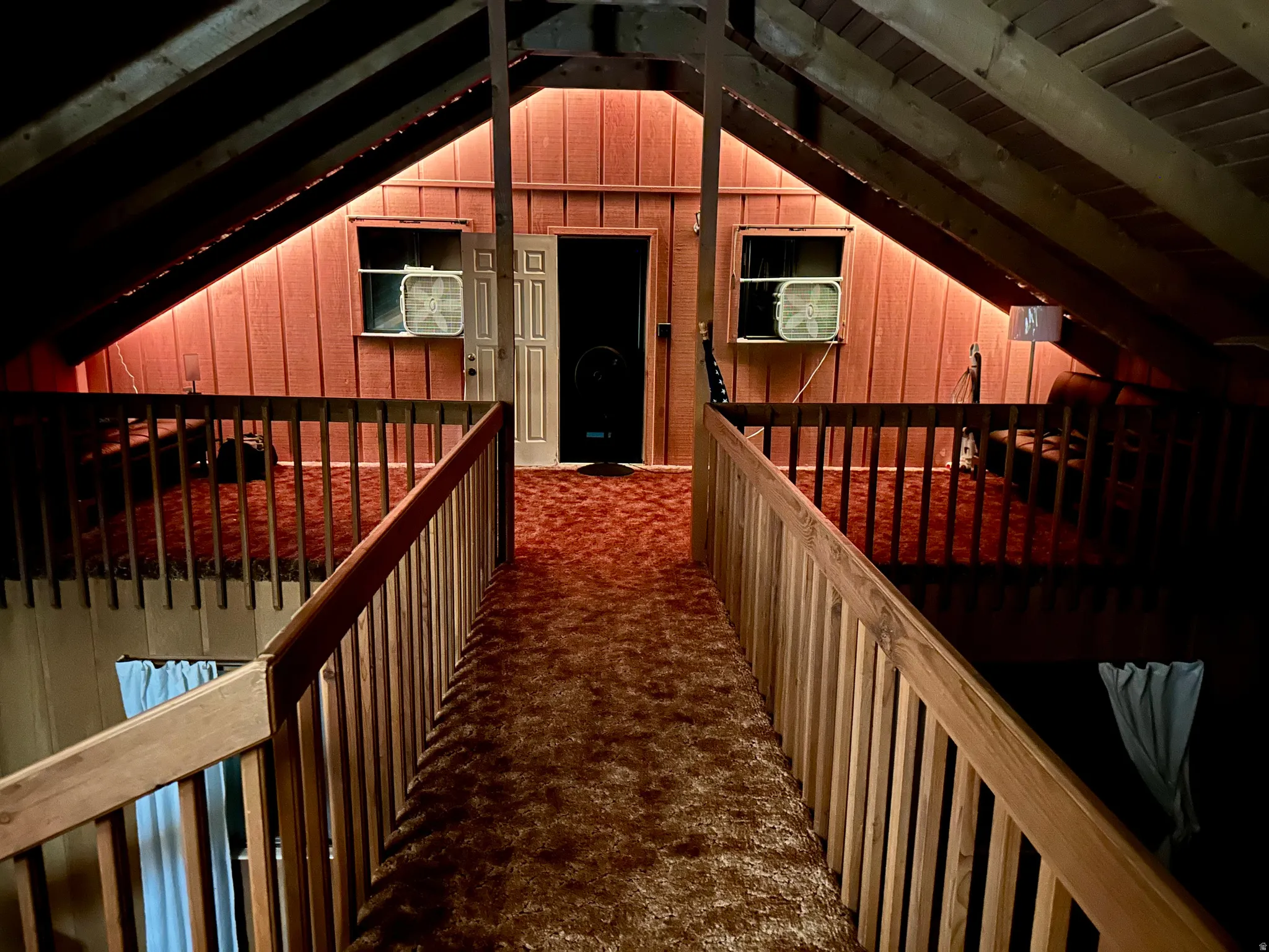 Corridor featuring an upstairs landing