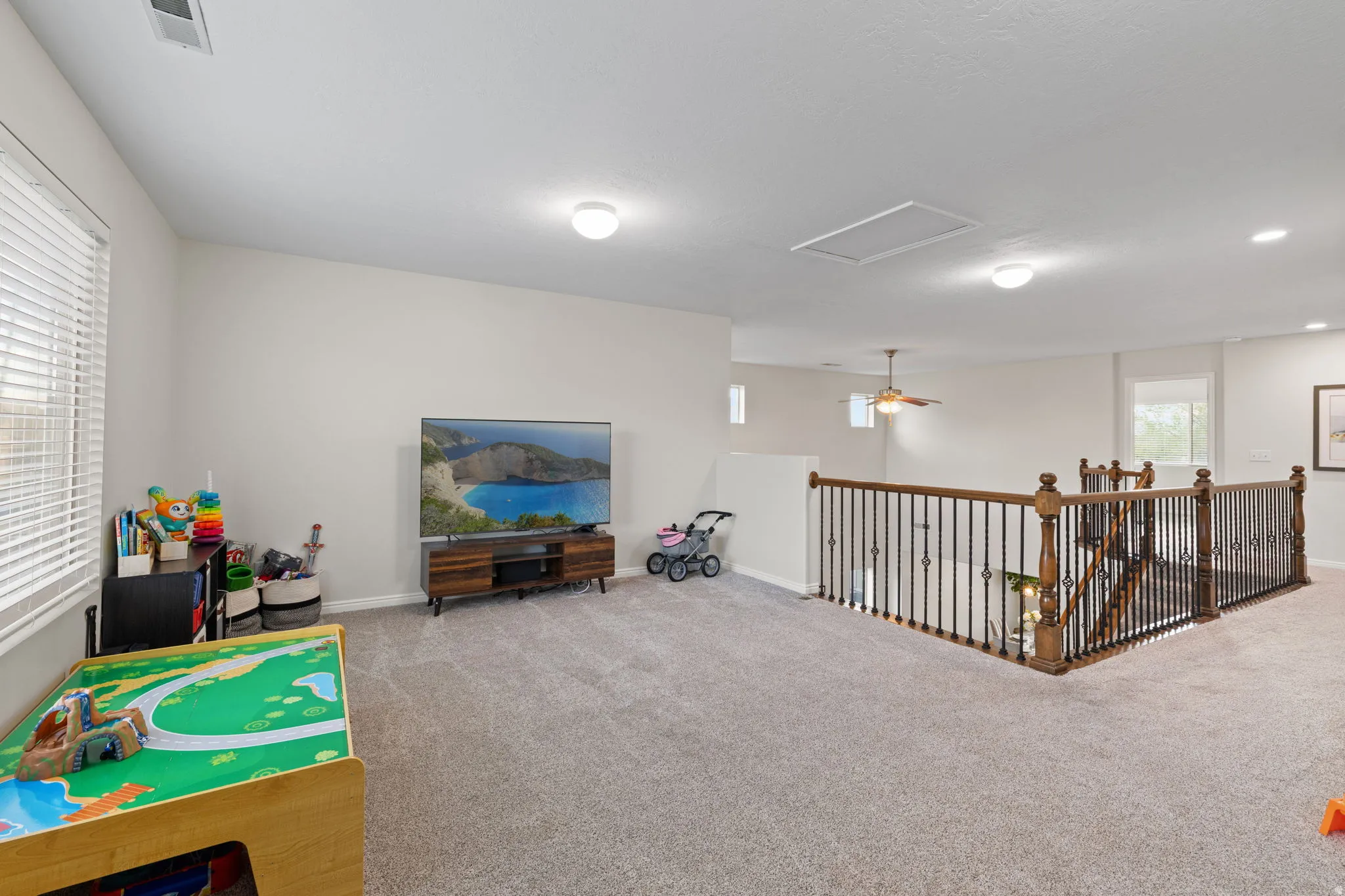 Game room with carpet and baseboards