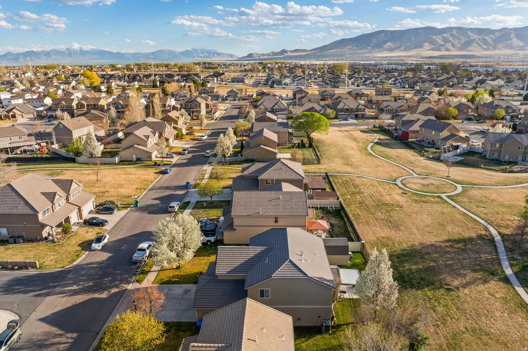 Aerial view of residential area featuring mountains