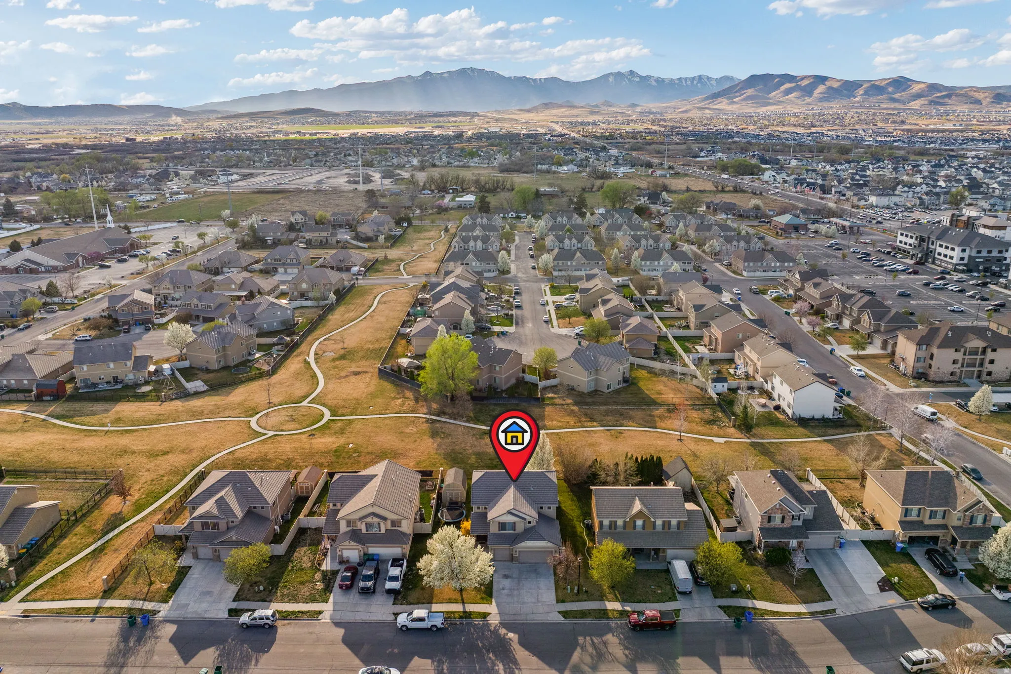 Aerial perspective of suburban area with mountains