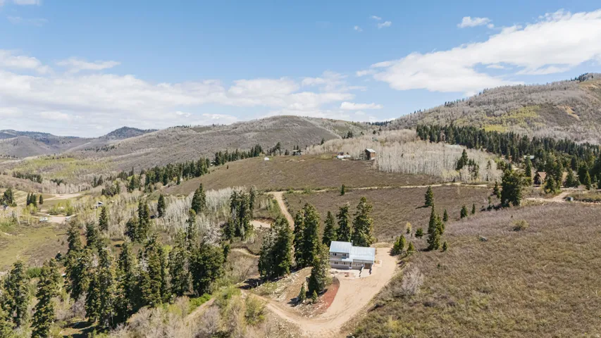 This cabin is perched high up on the hill