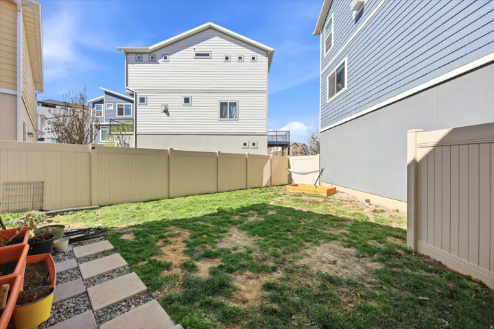 View of fenced backyard