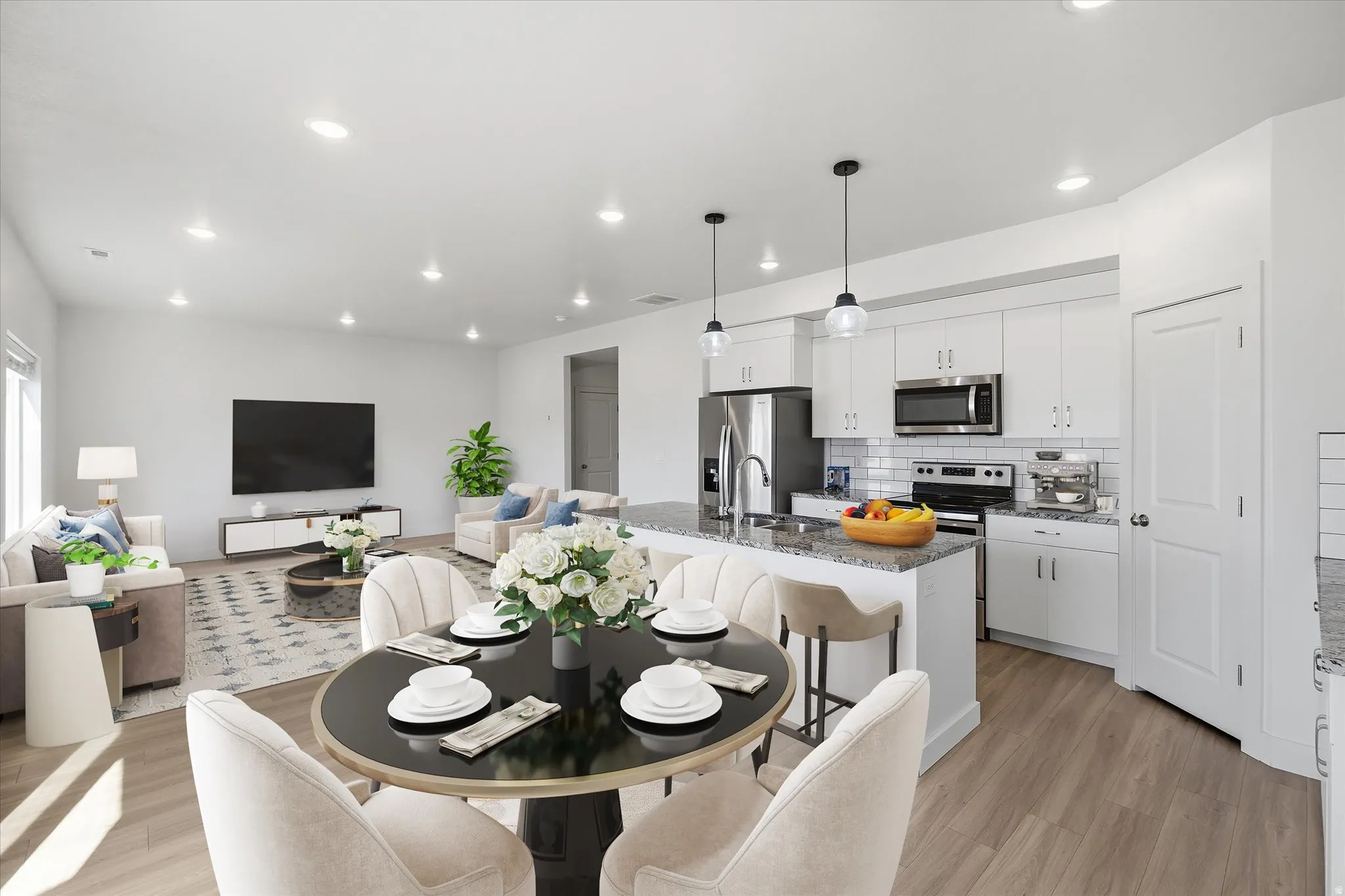 Dining area featuring light wood-style flooring and recessed lighting