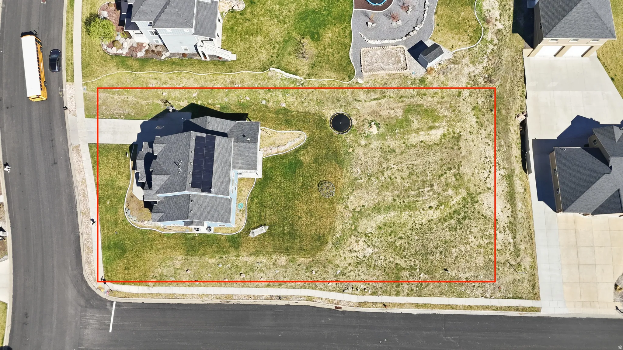 Aerial view highlighting the property's corner lot position.  Estimate only...buyer to verify exact property pin locations.