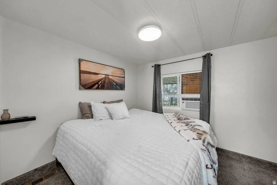Bedroom featuring carpet flooring