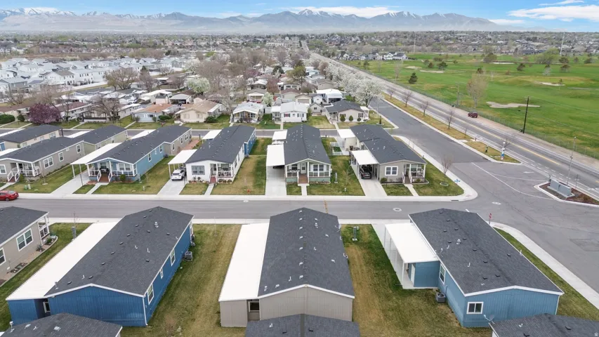 Aerial view of residential area with a mountainous background
