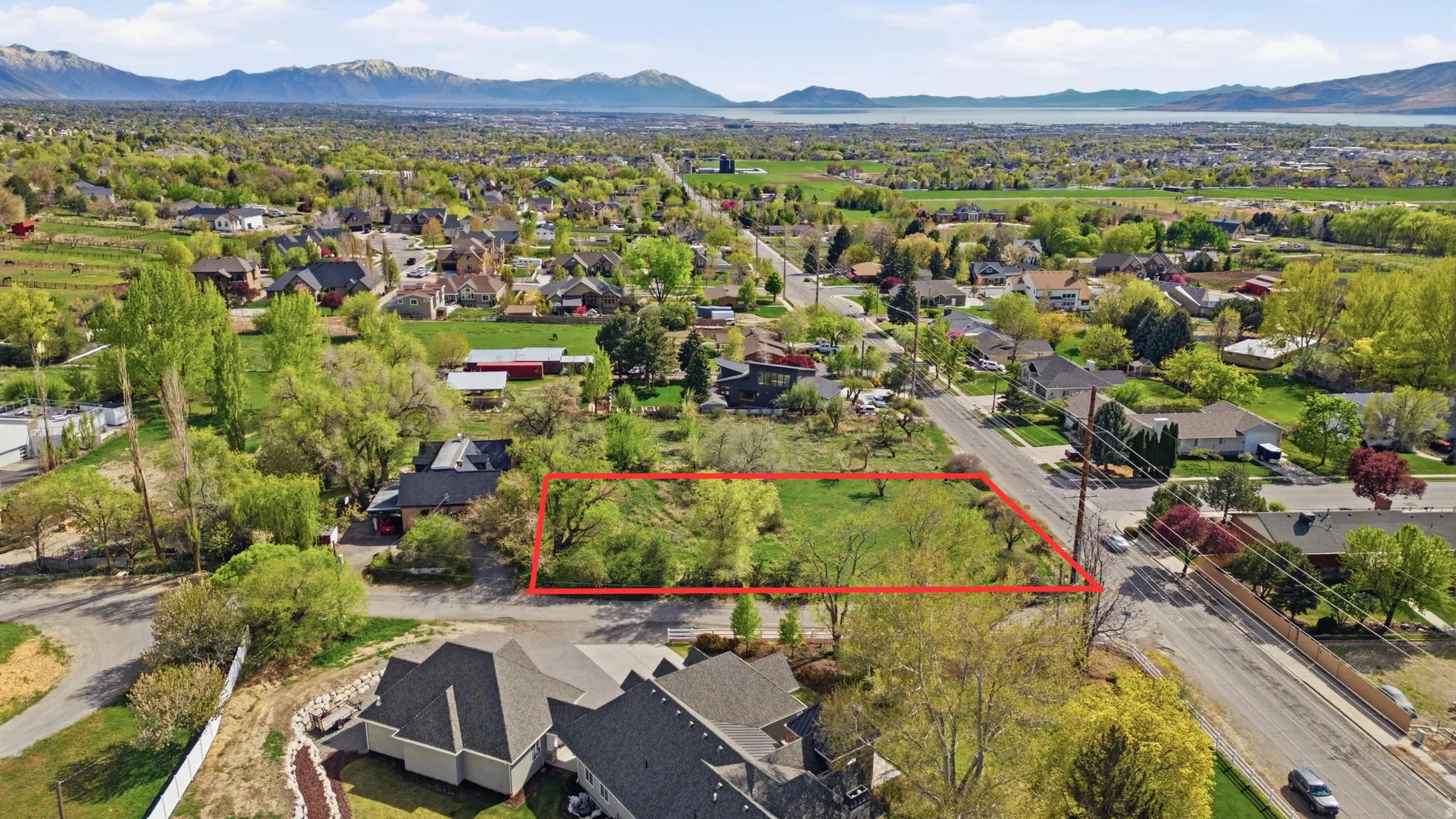 .5 Acre Aerial perspective of  half of the property highlighted