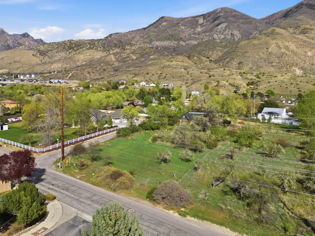 Drone / aerial view of Property and Mountain views