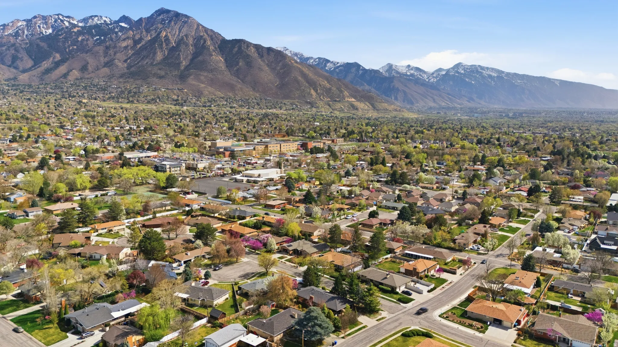 Aerial perspective of suburban area with mountains
