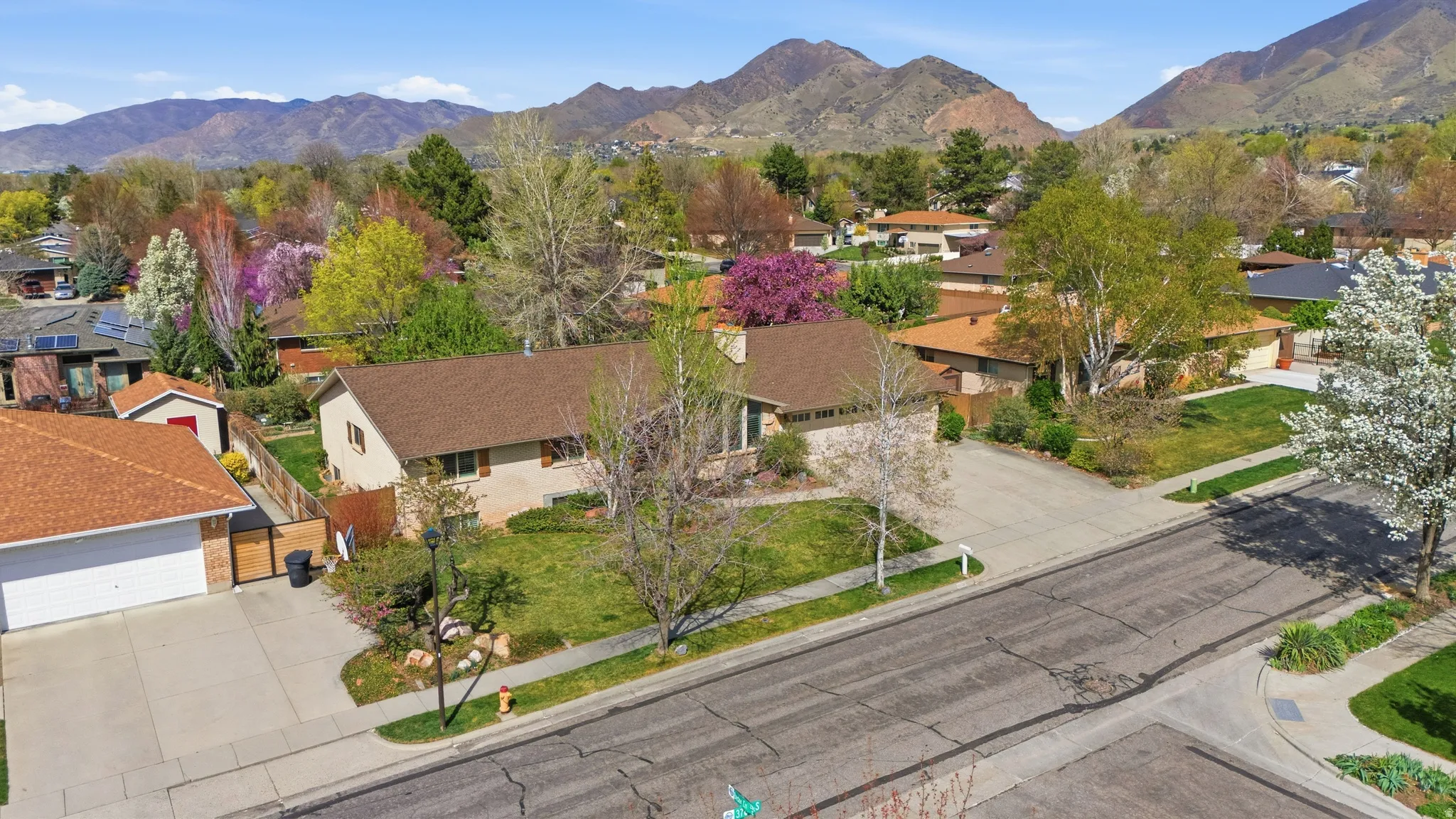 Aerial view of residential area with a mountain backdrop