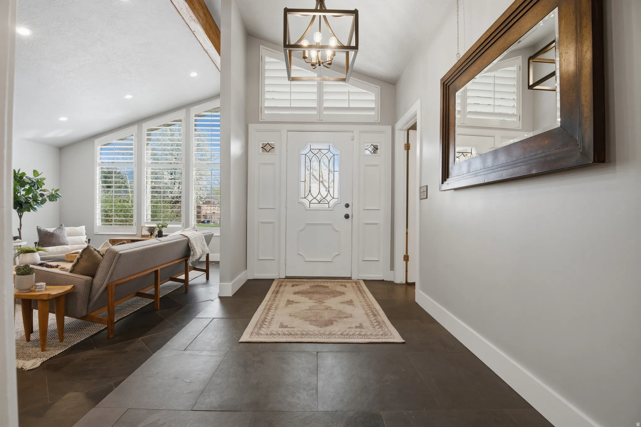 Entrance foyer with vaulted ceiling