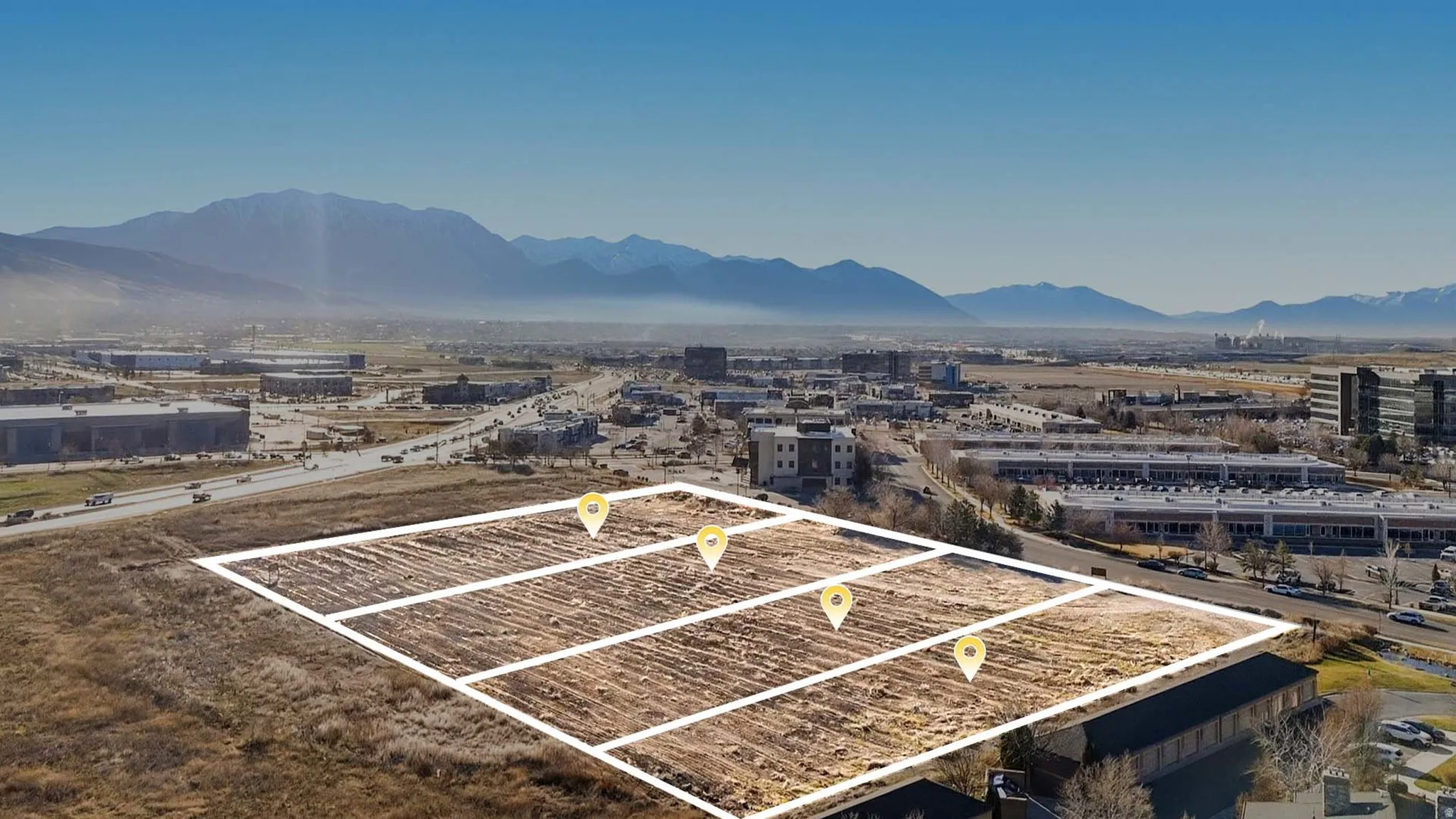 View of property location featuring a mountainous background and property parcel outlined