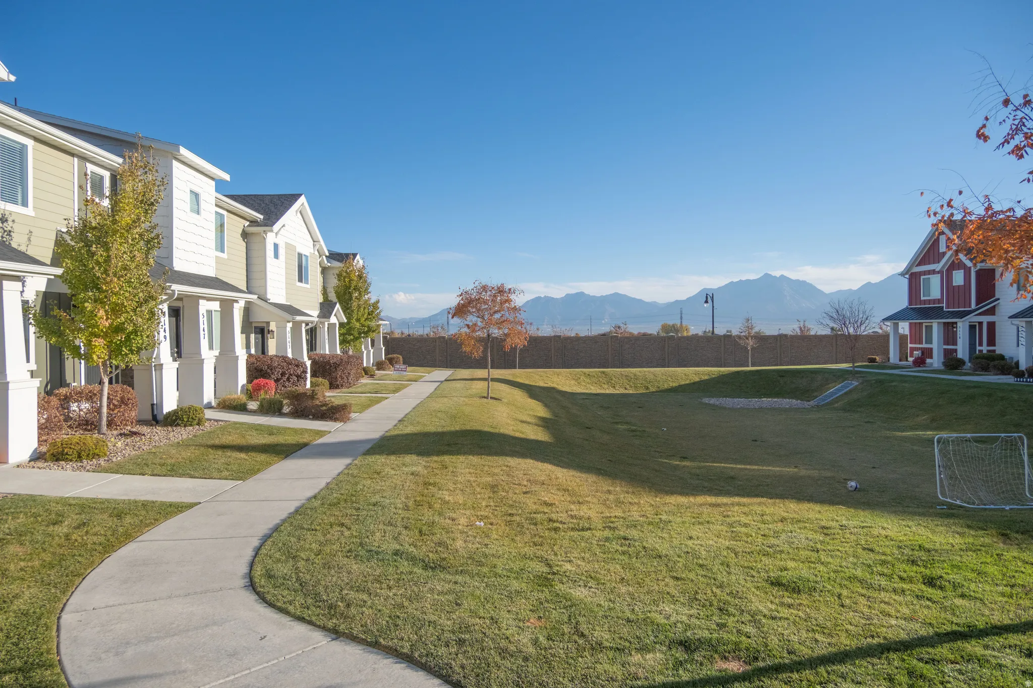 View of community featuring a mountain view and a residential view