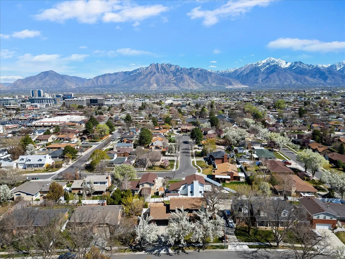 Aerial view of residential area with a mountain backdrop