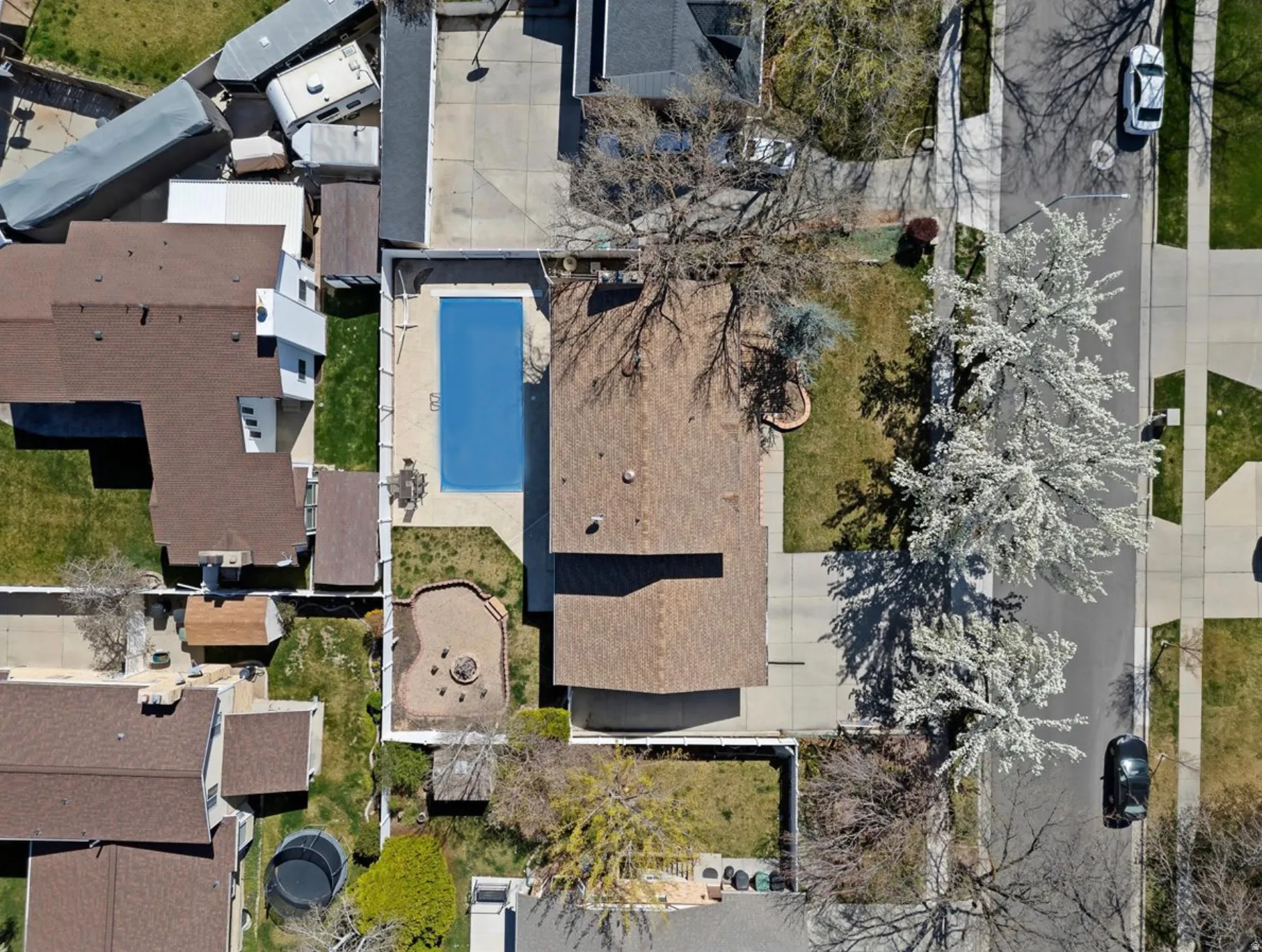 Aerial view of residential area featuring a pool area