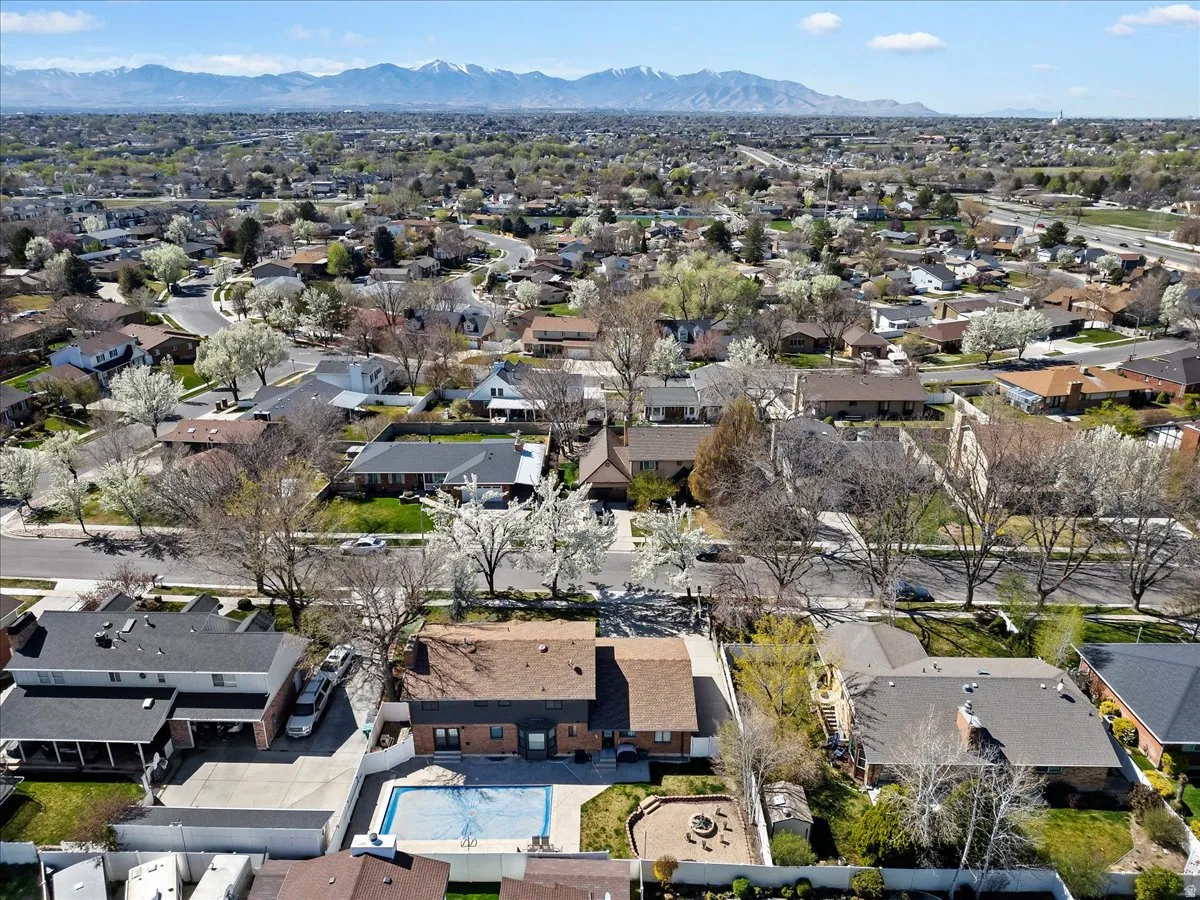 Aerial view of residential area with a mountainous background