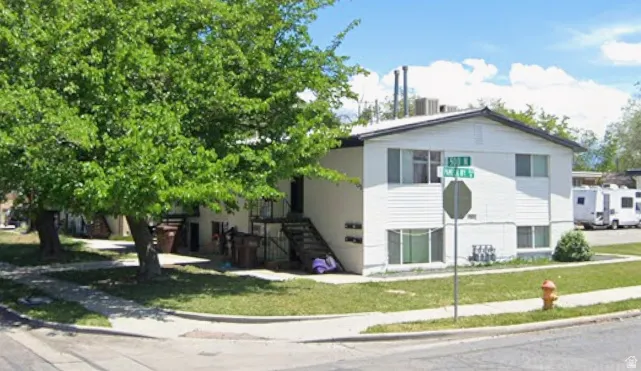 View of front of house featuring a front lawn