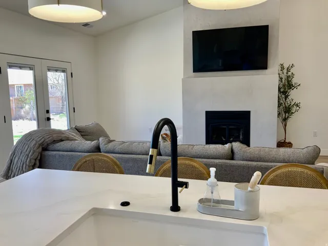Living area featuring a high end fireplace