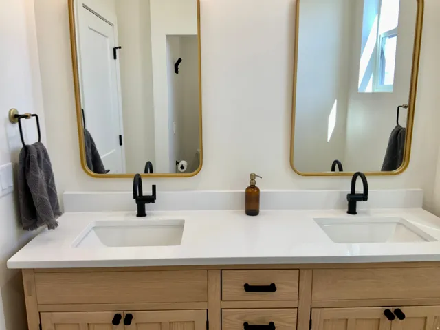 Full bathroom featuring double vanity