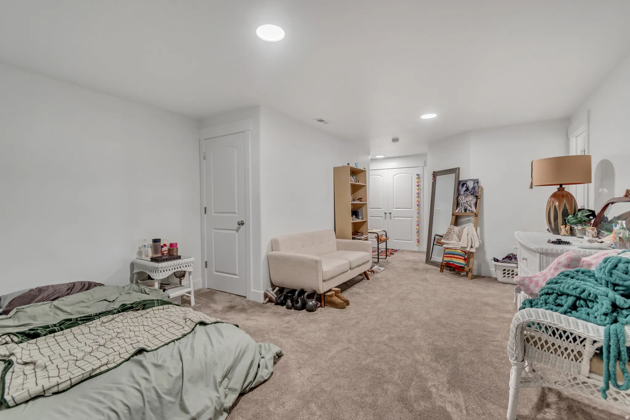 Carpeted bedroom featuring recessed lighting