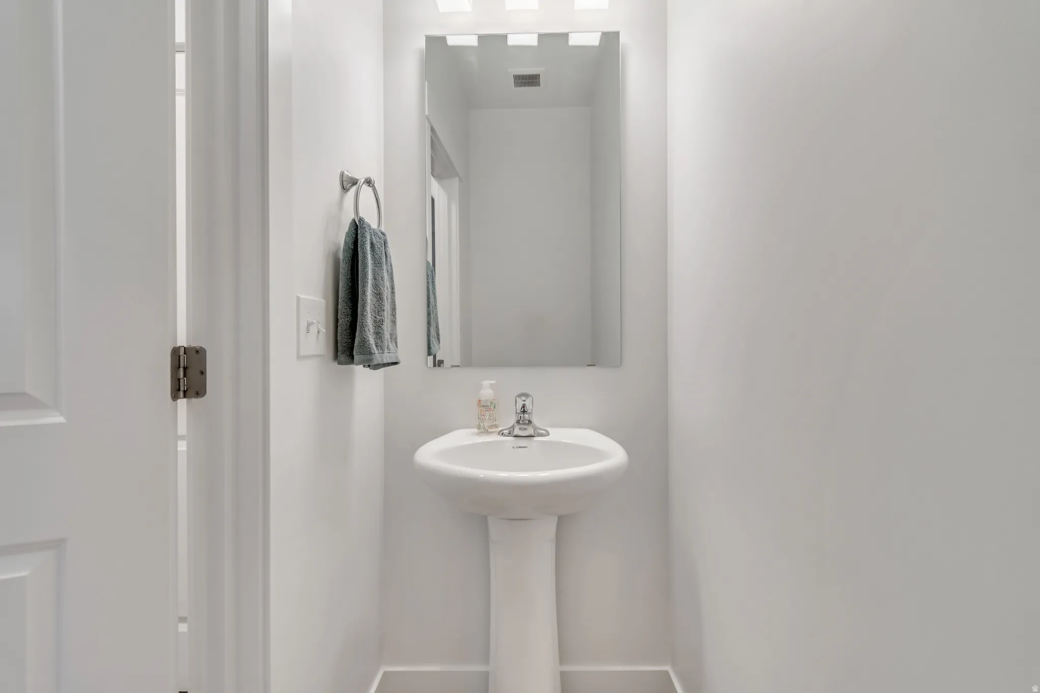 Bathroom featuring baseboards