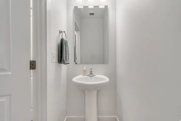 Bathroom featuring baseboards