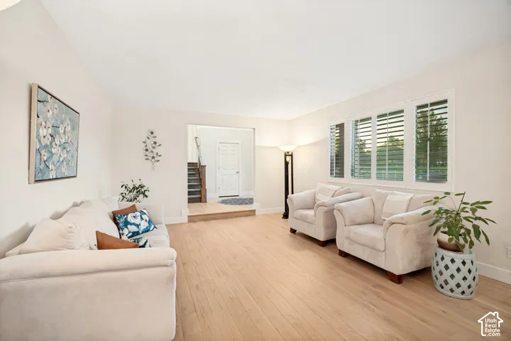 Formal Living Room with hardwood flooring and plantation shutters