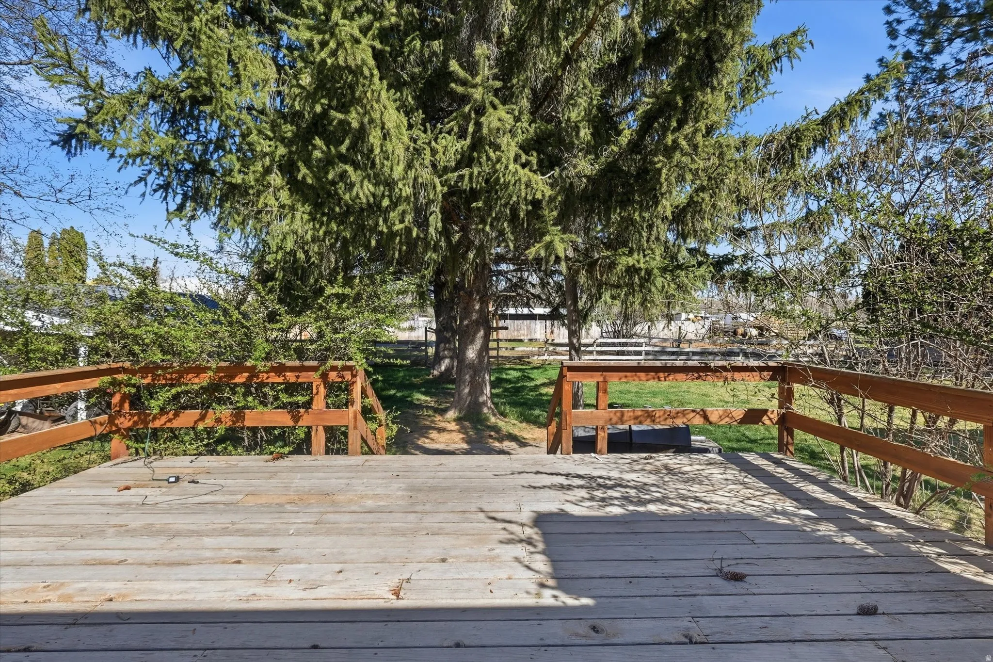 View of wooden deck facing from home exit