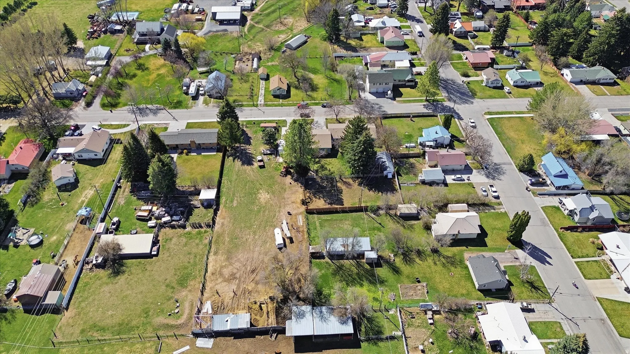 Aerial overview of property's location featuring nearby suburban area