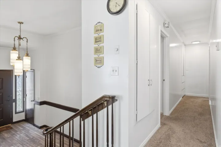 Entrance foyer featuring ornamental molding
