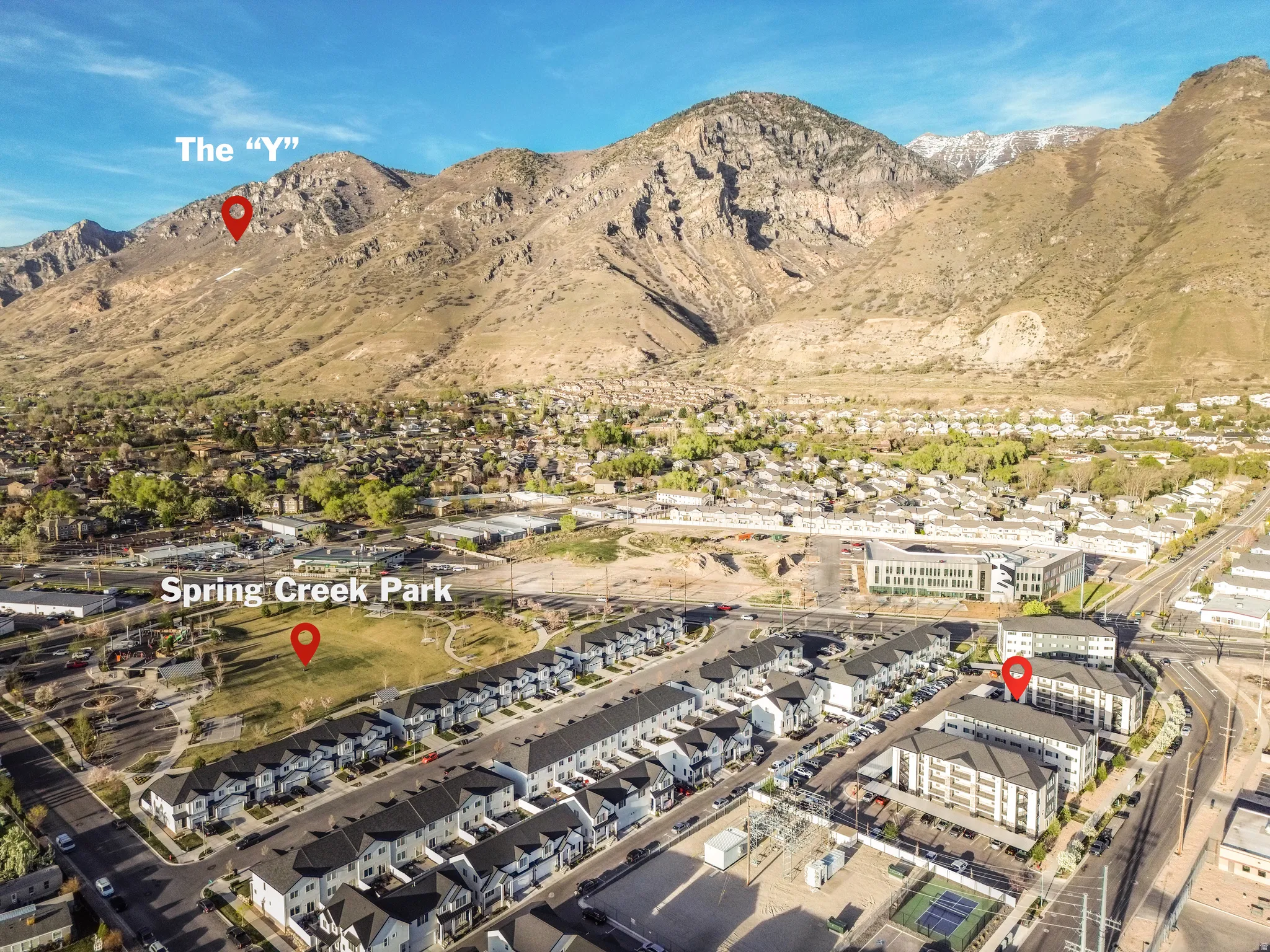 View of mountain background featuring nearby suburban area