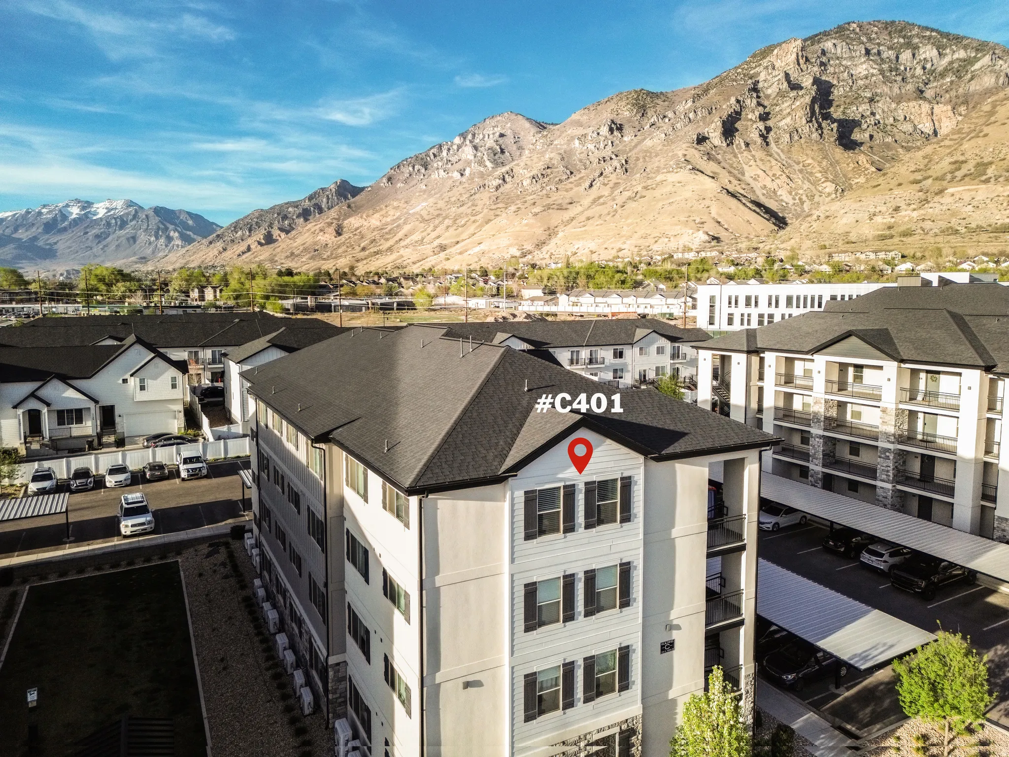 View of mountain background featuring nearby suburban area