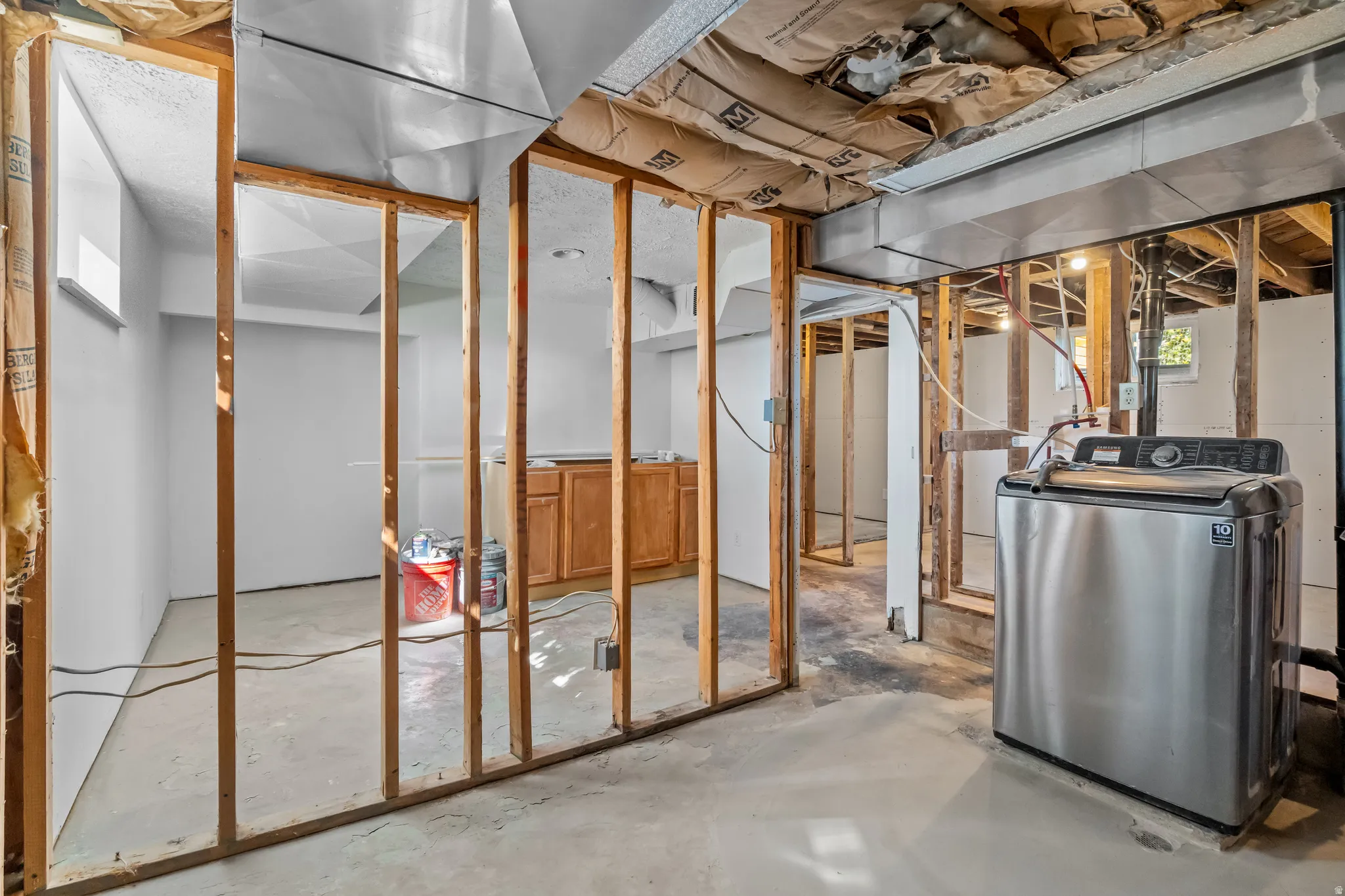 Basement with washer / clothes dryer