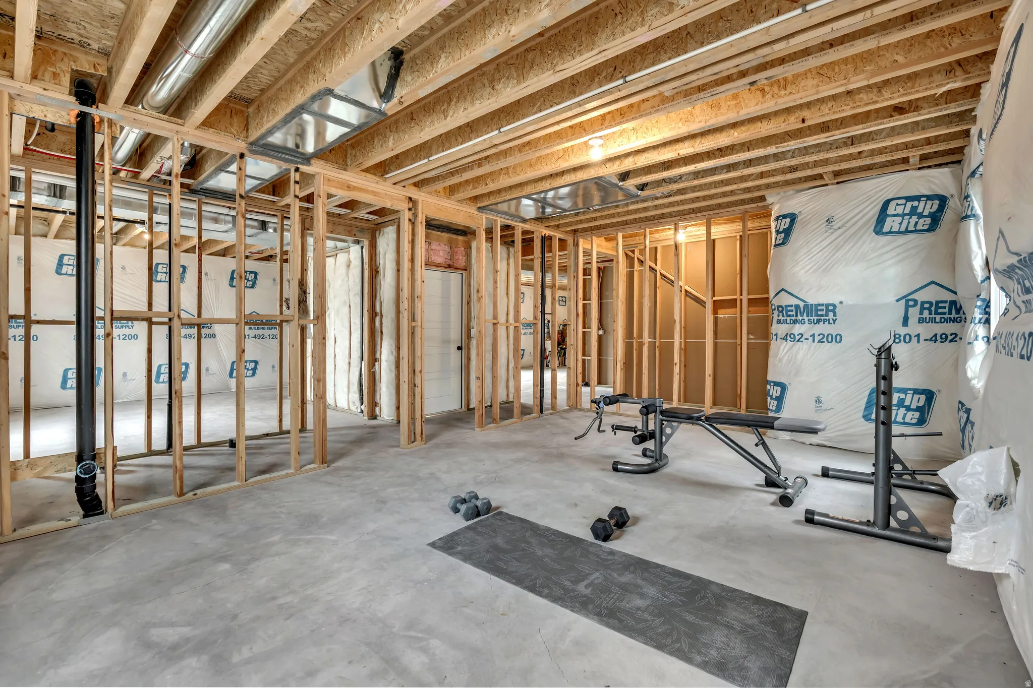 Exercise room with concrete floors