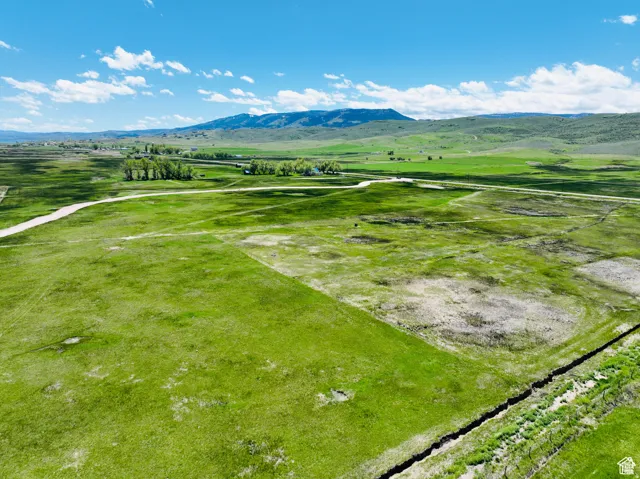 Overview of rural landscape featuring mountains