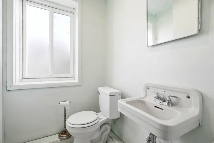 Bathroom with toilet and a sink