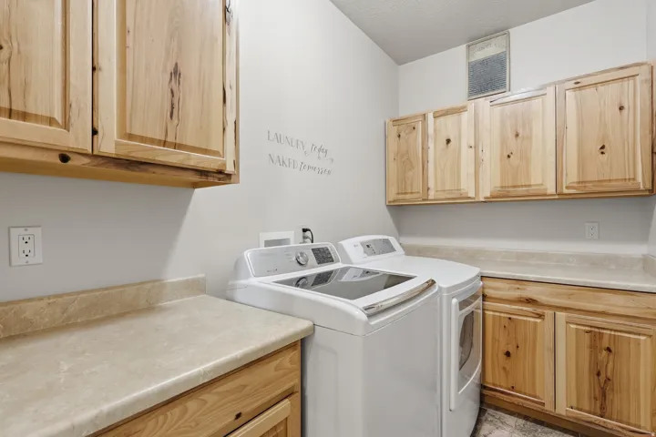 Laundry area with separate washer and dryer