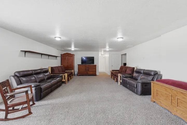 Living area with light colored carpet