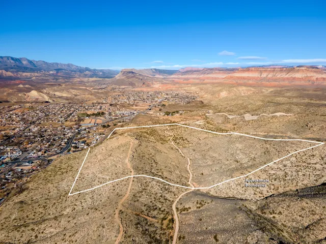 View of rural area featuring mountains and a desert landscape