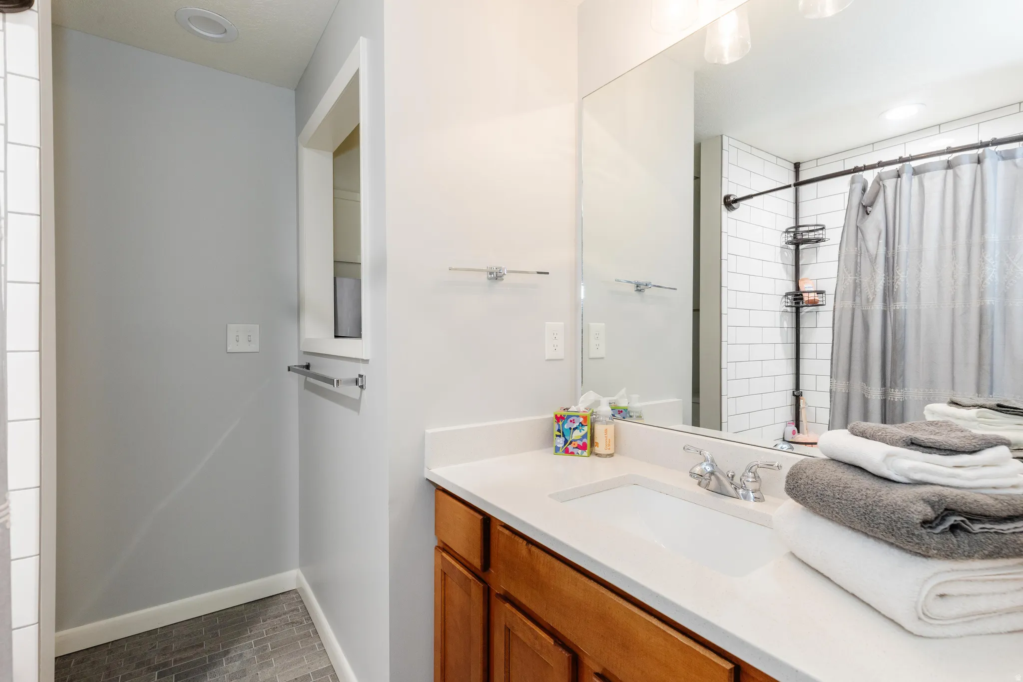 Master Full bathroom with vanity and a shower with curtain