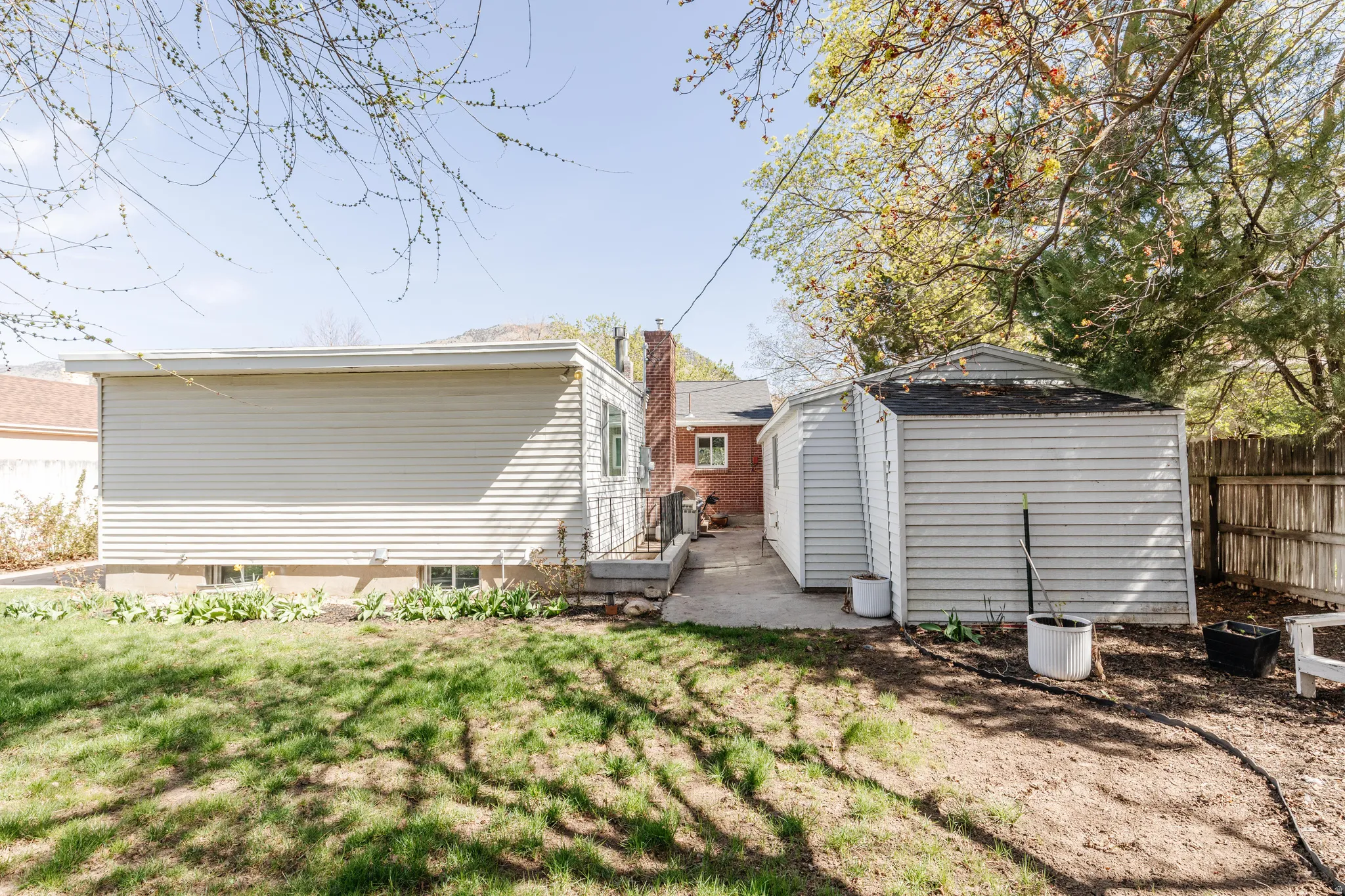 View of fenced backyard