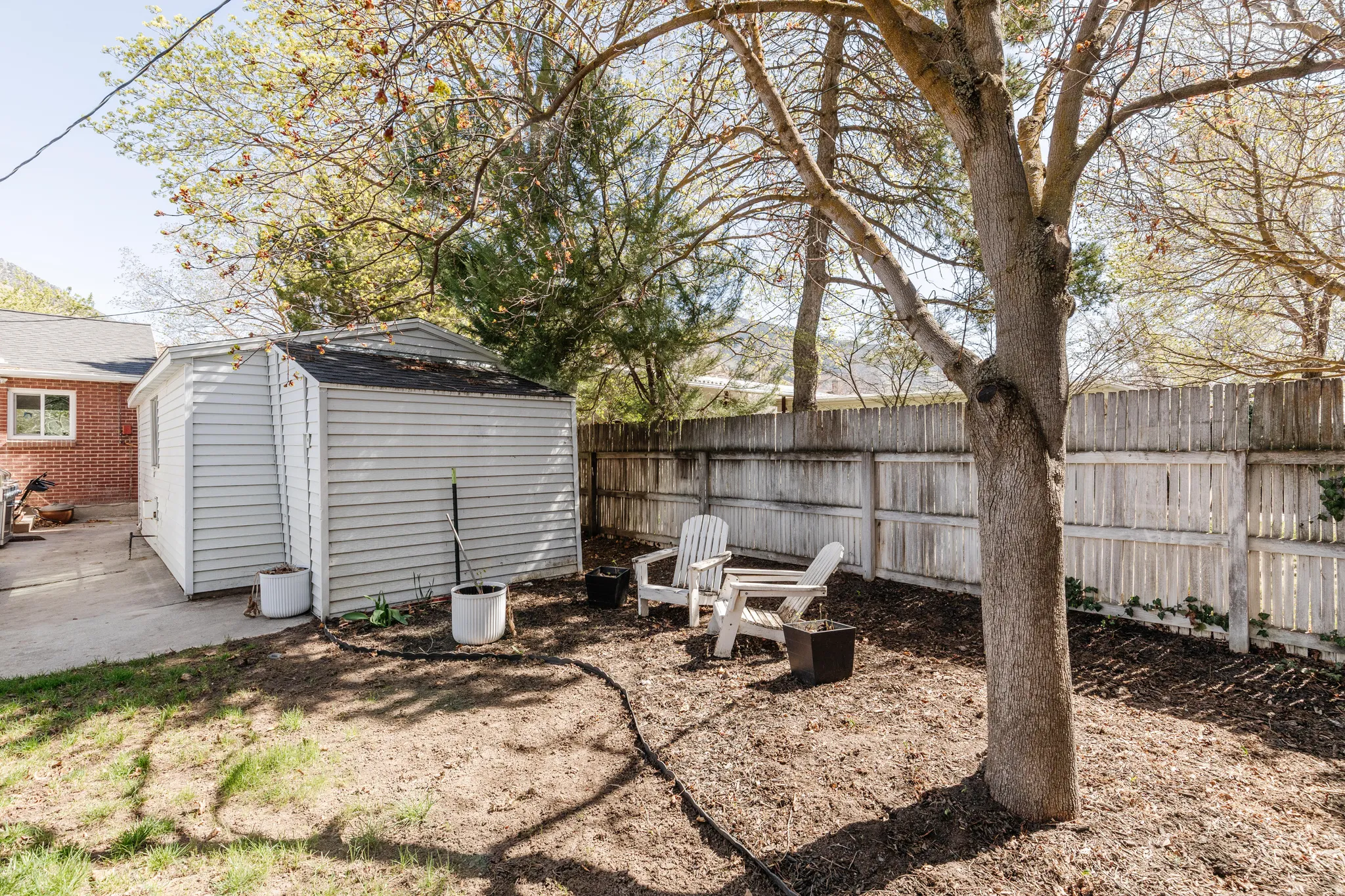 View of fenced backyard